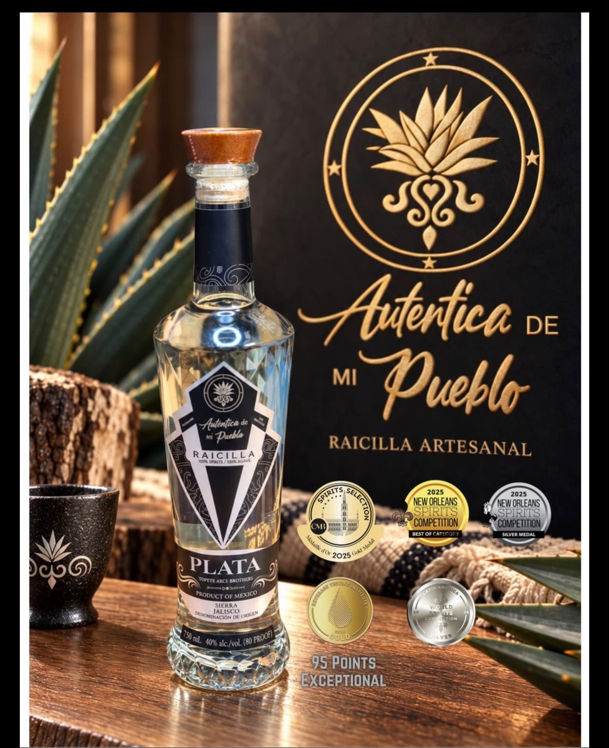 Bottle of Plata tequila displayed with agave plant, gold lotus logo, and award medals on wooden surface
